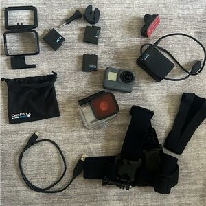 Waterproof GoPro 5 Action Camera with Black and Red Accessories